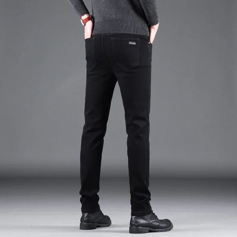 Spring Autumn New Men's Pure Black Slim Jeans Elastic Straight